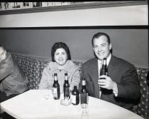 Woman with Ronnie Etchison at Ringside Bar table