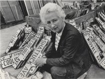 Portrait of Patricia Loomis with San Jose street signs