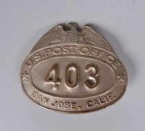 Postal worker's hat badge