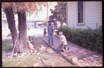 Laying brick walkway at San Jose Historical Museum