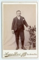 Portrait of a young man in three-piece suit