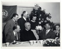 Bea Alvernaz presenting APPB president with flowers