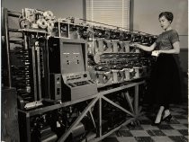 Woman with early computer