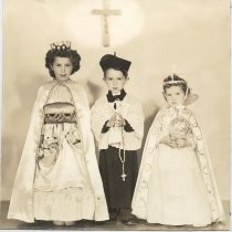Portrait of three children dressed in festa costumes