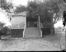 View of cottage with trees, c. 1912