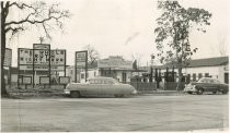 Car in front of Holy City buildings