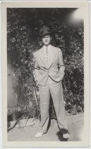Bohnett family member in suit and tie with hat and white shoes