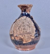 Ceramic wine bottle