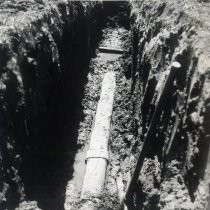 Laying pipe in ditch