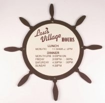 Lou's Village sign