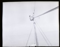 Seaman atop a mast