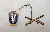 95th Division pin with crossed rifles