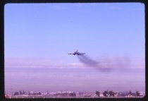 Plane coming in for landing at San Jose Airport, 1971