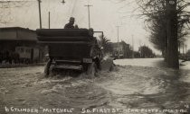 Mitchell automobile on flooded street