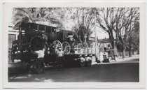 Trailer loaded with two horse-drawn carriages