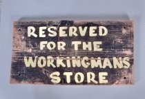 Reserved for the Workingmans Store parking sign