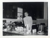 Ruby Levin posing in her kitchen