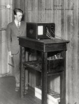 Cliff Gardner with first television receiver used by Philo T. Farnsworth