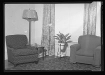 Living room interior with two arm chairs