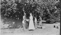 Picking fruit at Winchester House, San Jose, CA