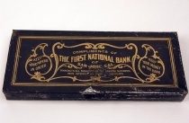 The First National Bank documents tin