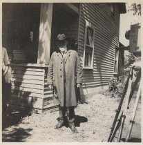 Edwin Markham in front of house at 432 South Eighth Street, San Jose