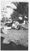 Cyclists resting on grass