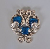 Silver and blue glass brooch