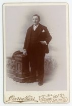 Portrait of a Young Man in Three-Piece Suit