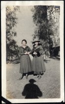 Two women in school uniform