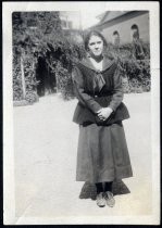 Portrait of young woman in school uniform