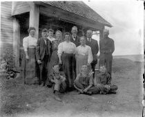 Family portrait in front of country house, c. 1912