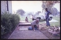 Laying brick walkway at San Jose Historical Museum