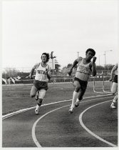 Chris Morrisey and Millard Hampton in a 220-yard dash