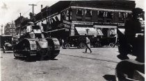 Tank rolling down Cedar Rapids, Iowa, street