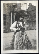 Young woman in grass skirt with ukelele Three Women in Park Two Women Standing Outdoors