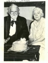 Edwin Markham and wife with birthday cake