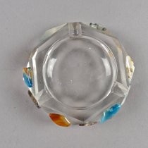 Semi-precious stones on glass ashtray