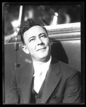 Man in three-piece, pinstripe suit