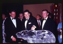 Ronald Reagan admiring an ice sculpture