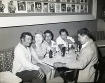 Shirlie Montgomery with group of men, Ringside Bar