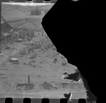 Partial negative, wreckage on beach