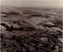 Aerial view of east hills above Fremont, looking south