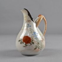 Pitcher with flower design