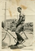 Theodore Carney on bicycle