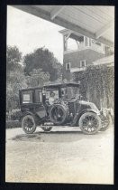 Automobile outside Sarah Winchester home, tank house