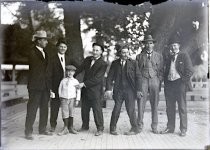 Six men and a young boy