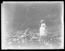 Two children hunting frogs at Camp Taylor