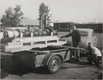 Doug Perham loads klystron into his trailer