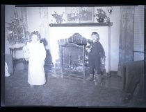 Two children at Christmas, c. 1940